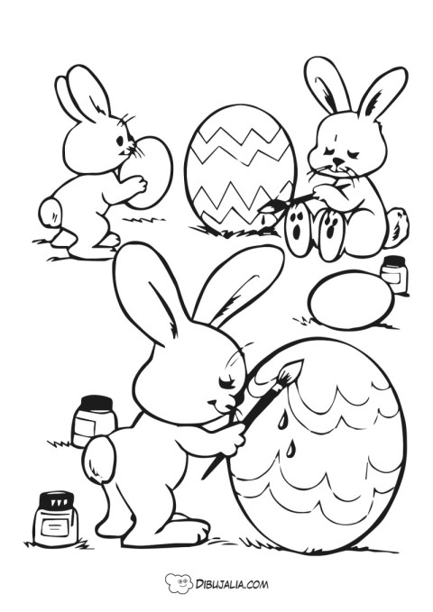 Conejos pintando Easter Eggs