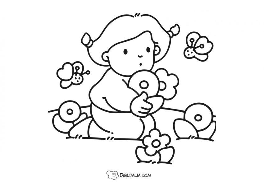 Niña con flores en primavera