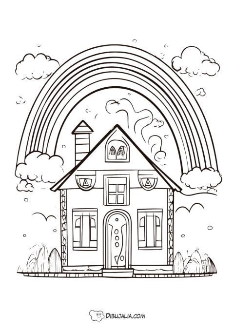 Casa con un arco iris